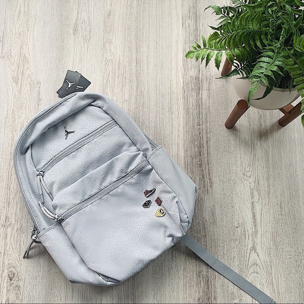 Nike Light Gray Backpack with Pin Accents